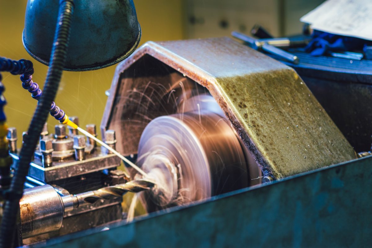 Aluminum Extrusion on a Lathe with Drill|Howard Precision Metals Aluminum Extrusion Being Machined-Howard Precision Metals